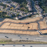 Aerial of view of graded dirt lots ready for new tract home construction in Los Angeles County California.